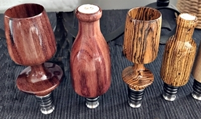 4 wood bottle stoppers turned as bottles and wine goblets