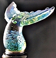 glass whale tail on stainless steel bottle stopper