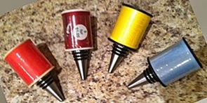 Spools of quilting thread bottle stoppers