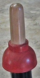 Plunger turned wood bottle stopper