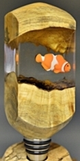 Nemo in resin with wood on a stainless steel bottle stopper