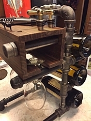 steampunk wine rack with bottle stopper and wine glass holder