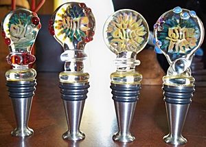 Bottle stoppers made from wine embedded in glass