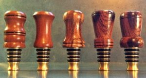 woodturnings on brass bottle stoppers
