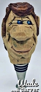 hand carved guy on stainless stopper base