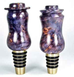 brass bottle stoppers with purple stabilized burl turnings