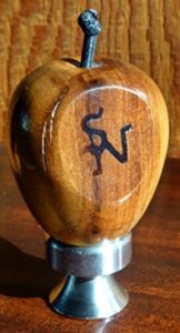 turned apple on stainless stoppers