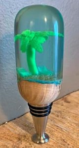 stainless stopper with palm tree and beach chairs