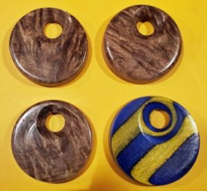 pendants turned off center
