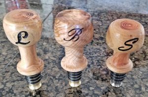 laser engraved initials on stainless steel bottle stoppers
