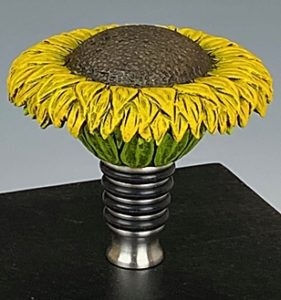 carved sunflower on stainless stopper