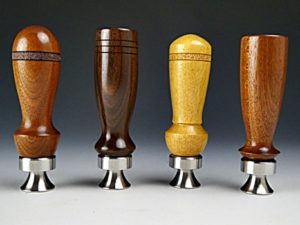 turned wood handle on stainless bottle opener