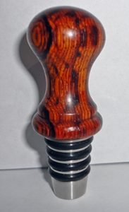 cocobolo turned on a stainless wine stopper