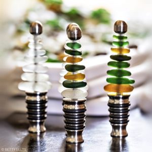 stainless stoppers with sea glass on top