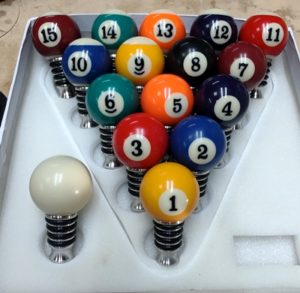 rack of pool balls wine bottle stoppers