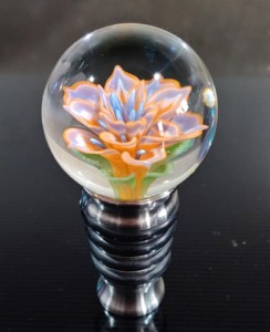 marble with flower on bottle stopper