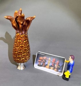Hand carved pineapple bottle opener.