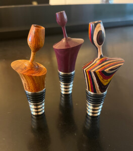 Off center stainless wine bottle stopper