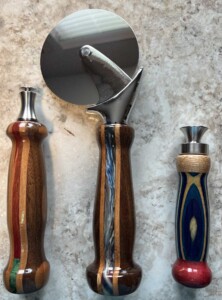 Niles bottle openers and pizza cutter